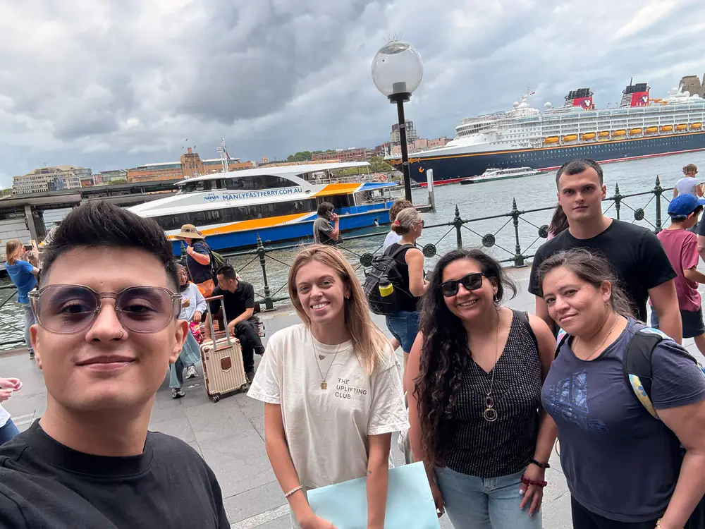 Circular Quay class photo Boston Institute class photo at Circular Quay with a cruise ship behind