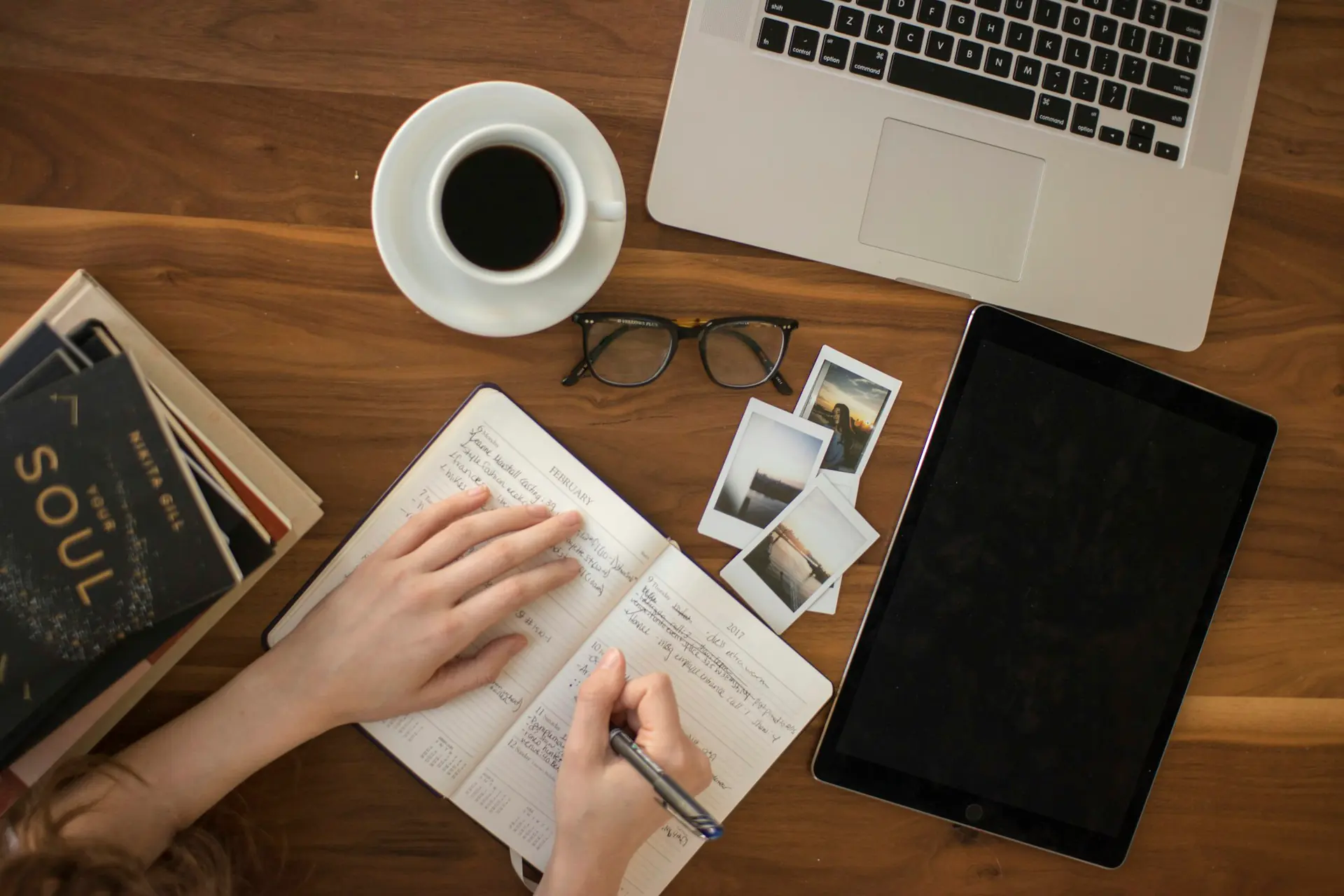 Study desk flat lay Flat lay of a study desk with laptop, notebook, glasses and coffee