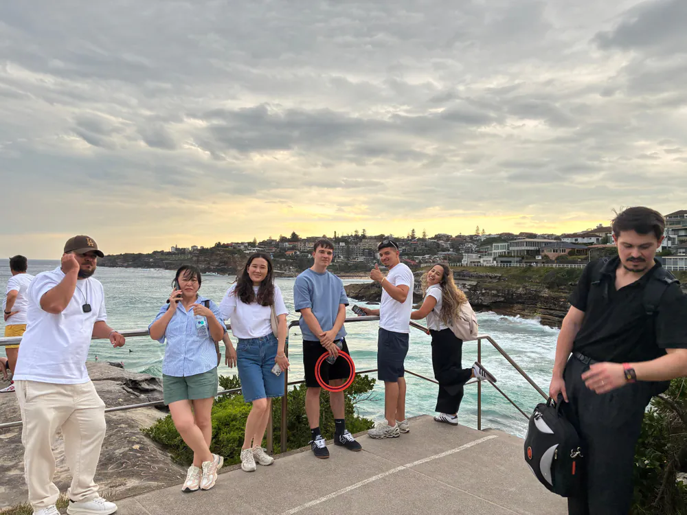 Coastal lookout at sunset Students at a Sydney coastal lookout at sunset during a class excursion