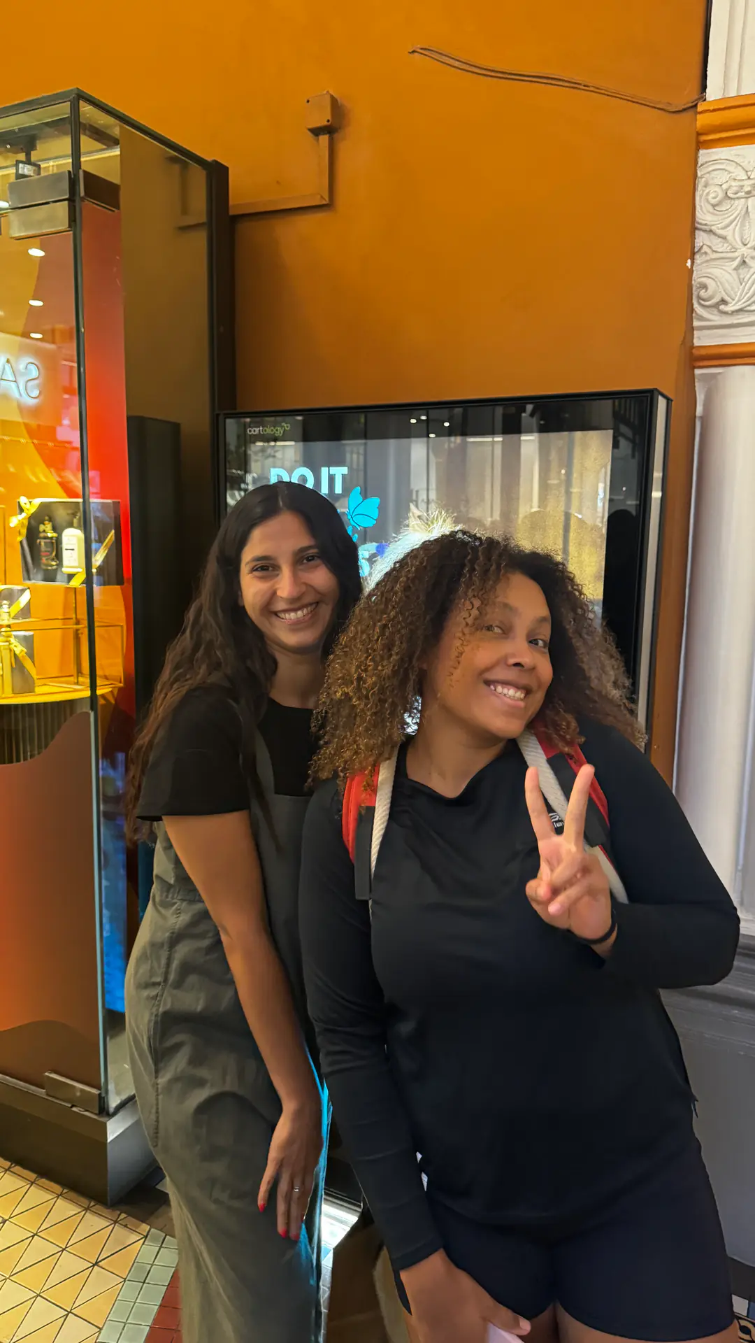 City excursion stop Two Boston Institute students at a shop during a Sydney city excursion