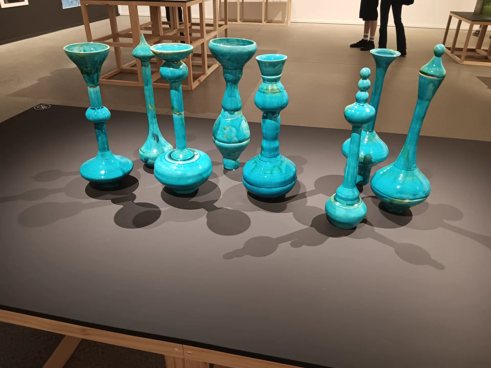 Glass vessel display Turquoise glass vessels on display at a Sydney art gallery
