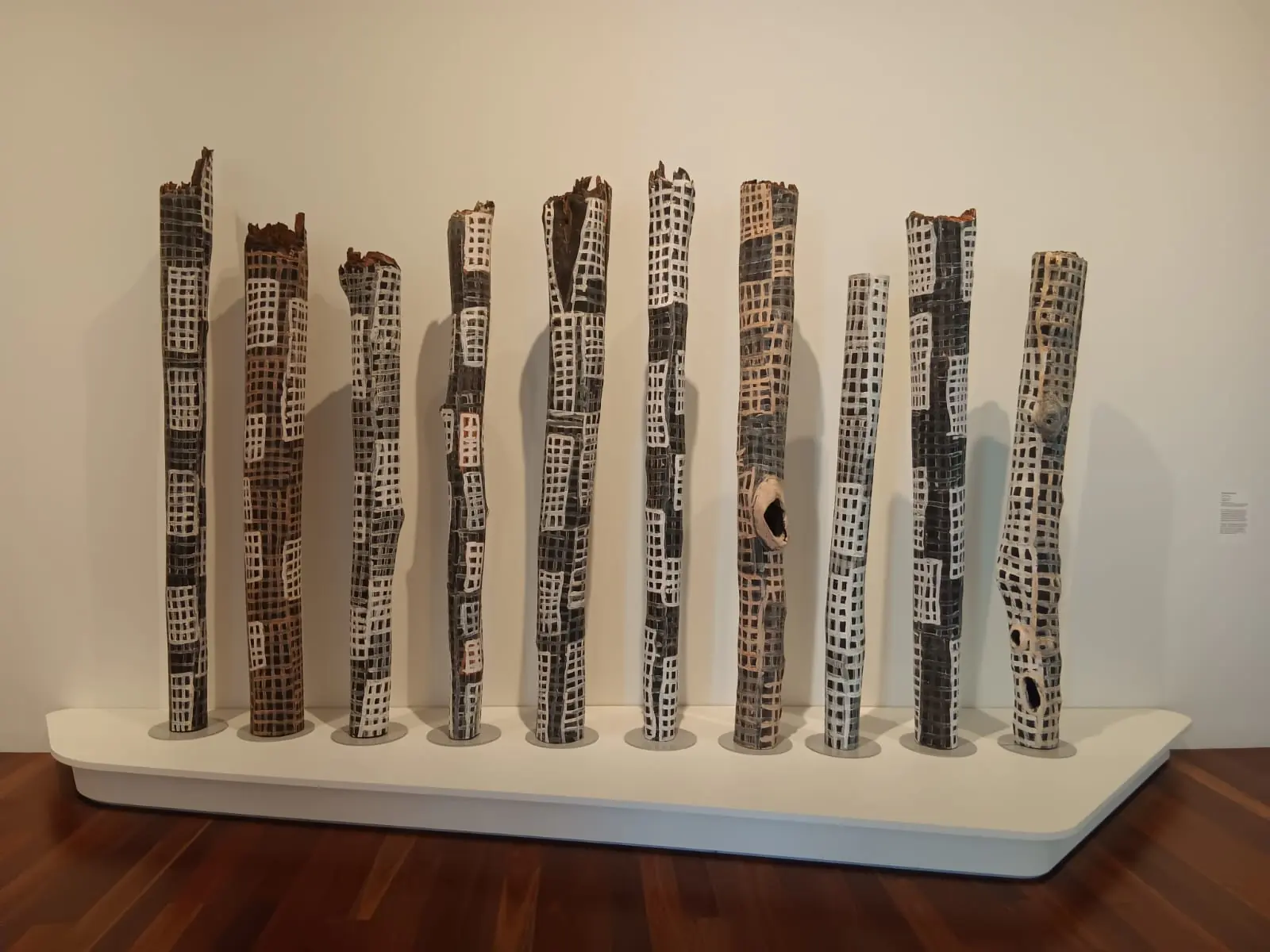 Art gallery excursion Carved memorial poles on display at a Sydney art gallery visited by Boston Institute students