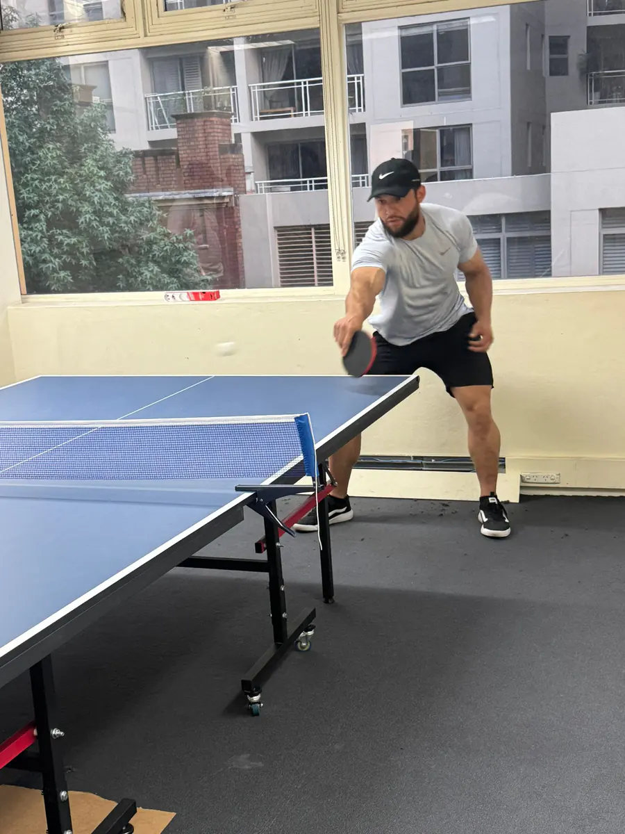 Baseline rally, 2025 Student returning the ball from the baseline in a table tennis match
