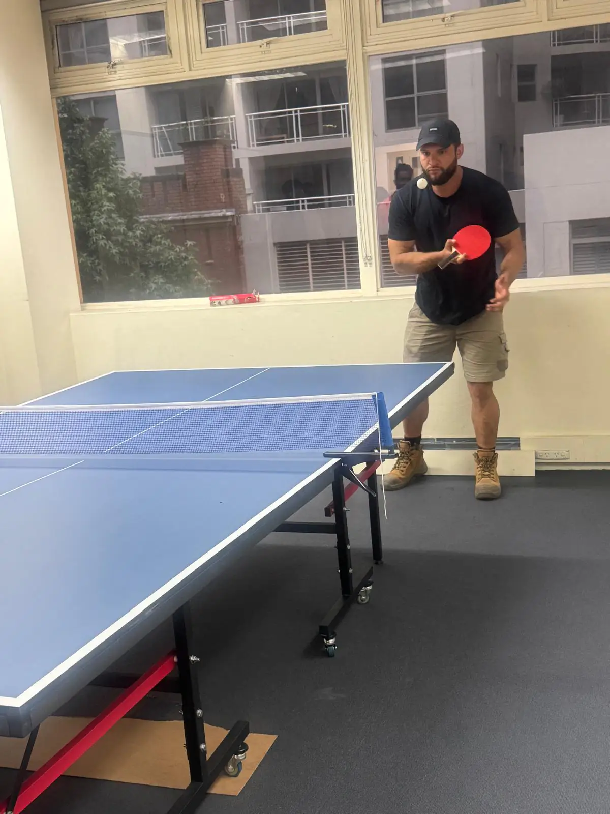 Forehand drive, 2025 Student playing a forehand drive at the Boston Institute table tennis table