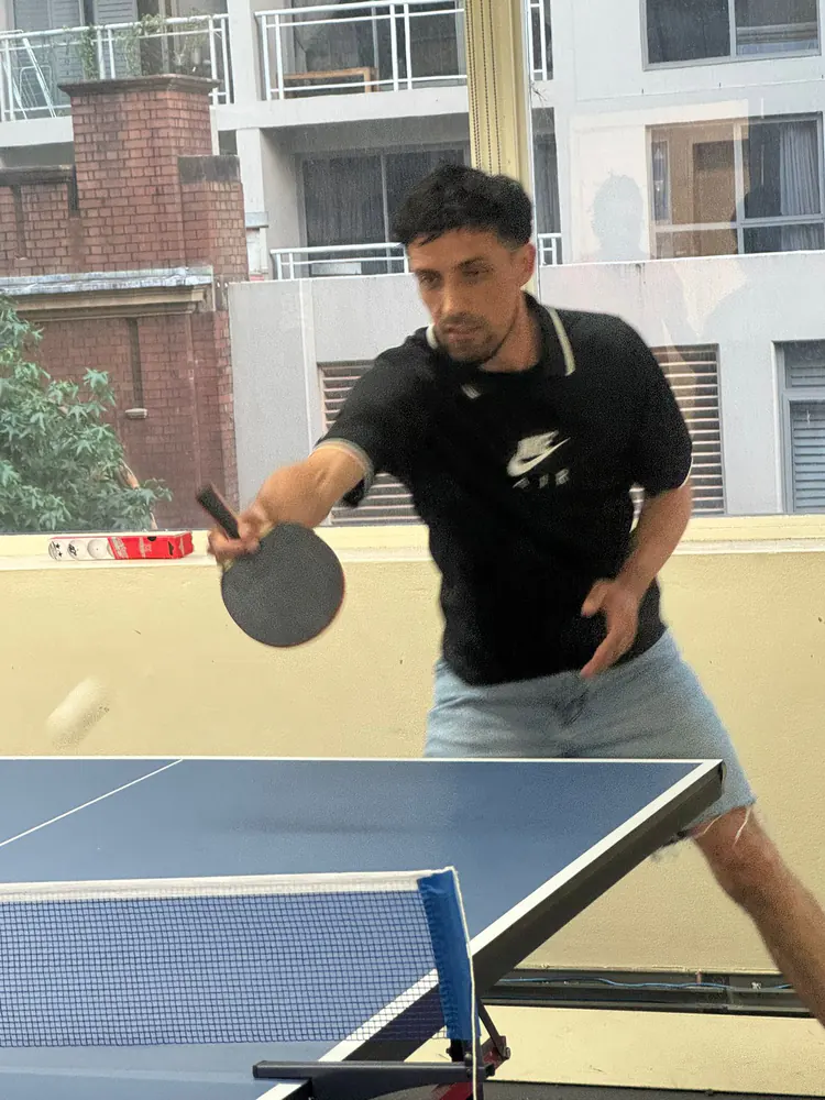 Forehand return, 2025 Student playing a forehand return during a Boston Institute table tennis match