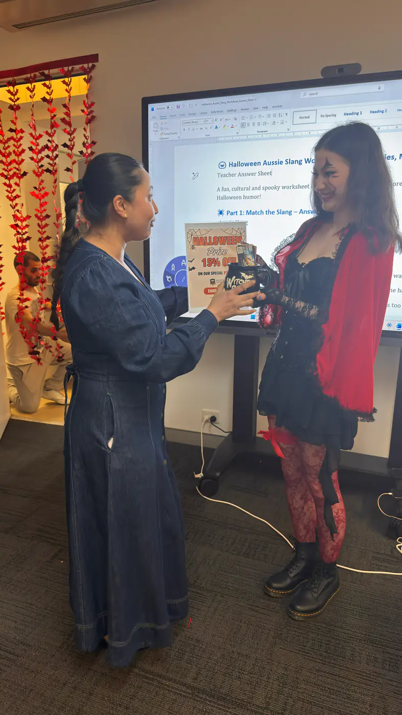 Best costume award, Halloween 2025 Student receiving the best Halloween costume award at Boston Institute