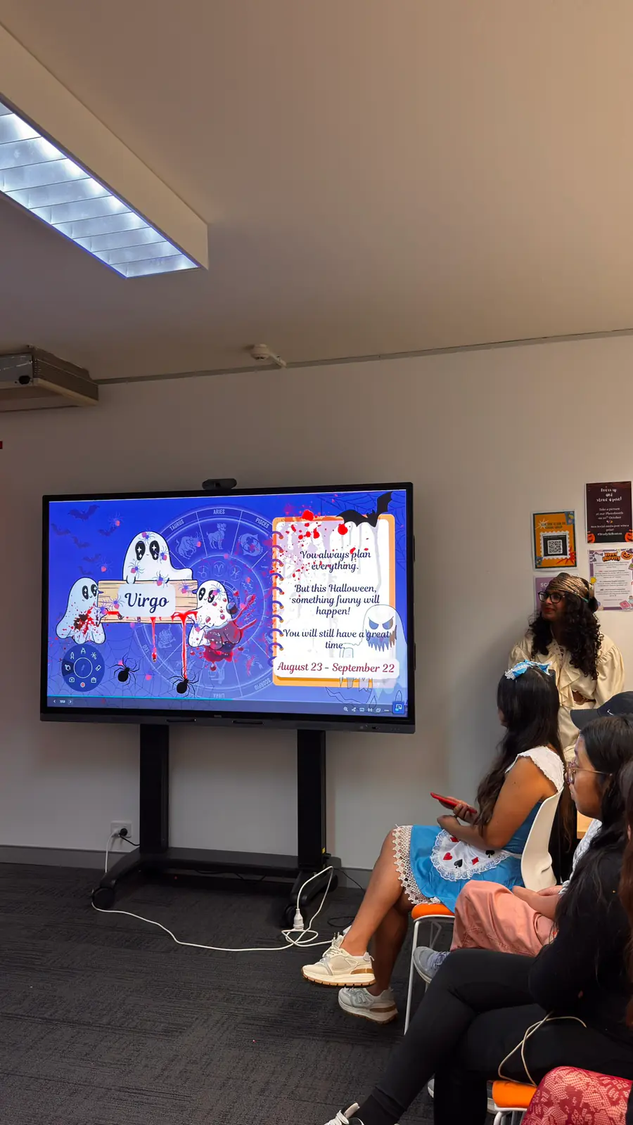 Halloween quiz session, 2025 Halloween quiz on a classroom screen with students taking part
