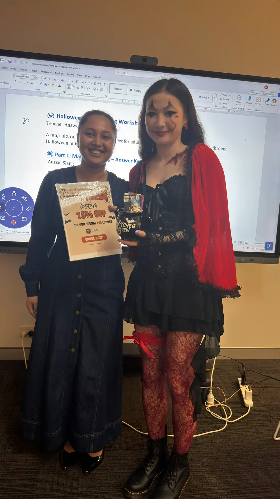 Costume winner, Halloween 2025 Halloween costume competition winner holding a certificate at Boston Institute