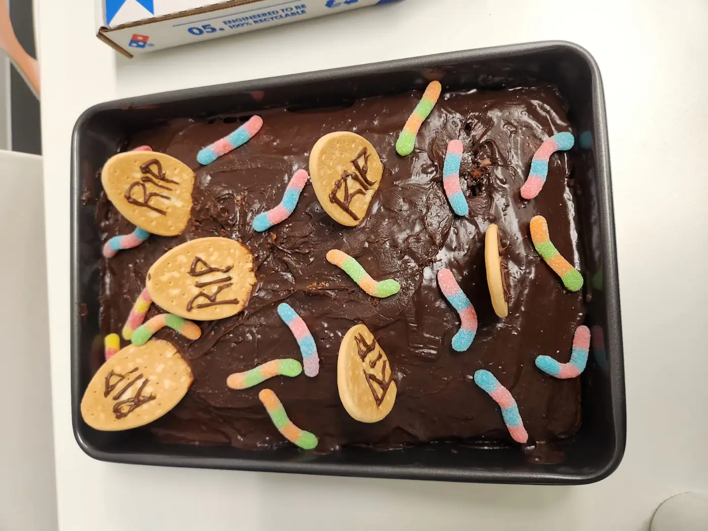 Halloween graveyard cake, 2025 Halloween brownie tray decorated with RIP tombstone cookies and gummy worms