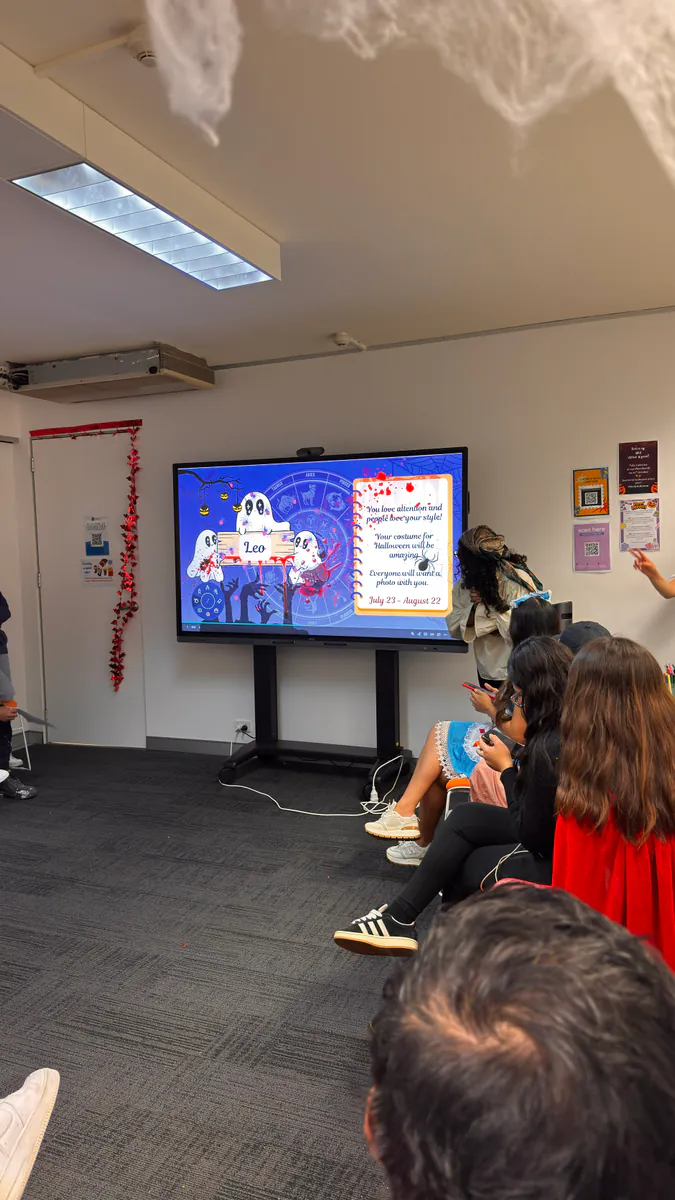 Halloween quiz, 2025 Students watching a Halloween quiz displayed on a classroom screen